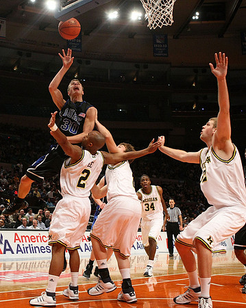 C.J. Lee (2), Zack Gibson (32), Zack Novak (0), and DeShawn Sims (34)