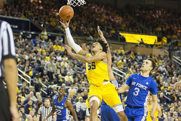 Eli Brooks (55) and Jordan Poole (2)