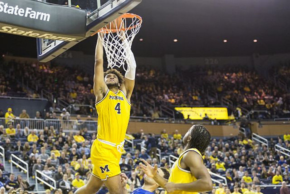 Isaiah Livers (4) and Zavier Simpson (3)
