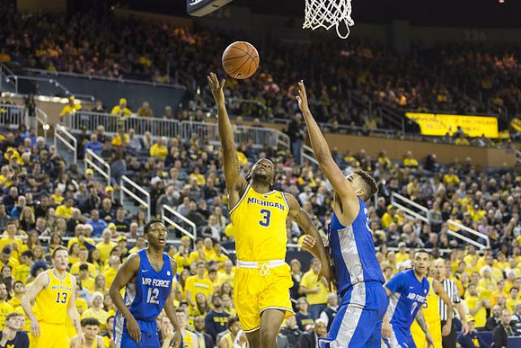 Ignas Brazdeikis (13) and Zavier Simpson (3)