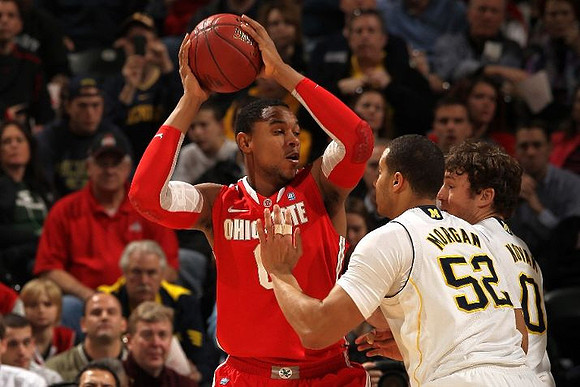 Jordan Morgan (52) and Zack Novak (0)