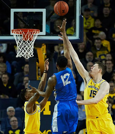 Charles Matthews (1) and Jon Teske (15)