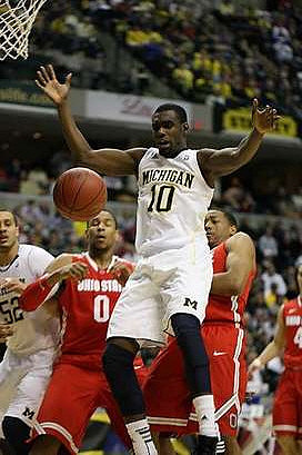 Jordan Morgan (52) and Tim Hardaway Jr. (10)