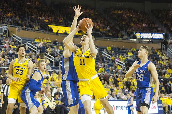 Brandon Johns Jr. (23) and Colin Castleton (11)
