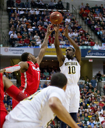 Jordan Morgan (52) and Tim Hardaway Jr. (10)