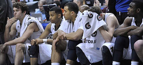 Zack Novak (0), Trey Burke (3), Jordan Morgan (52), Stu Douglass (1), and Tim Hardaway Jr. (10)