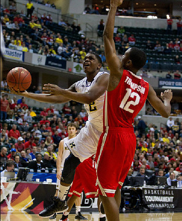 Zack Novak (0) and Carlton Brundidge (2)