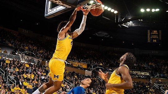 Isaiah Livers (4) and Zavier Simpson (3)