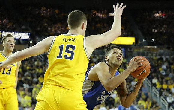 Ignas Brazdeikis (13) and Jon Teske (15)