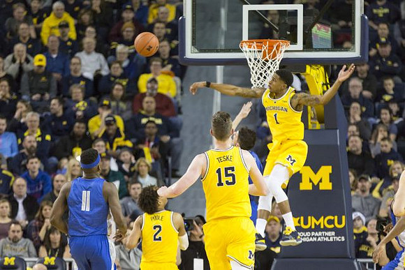 Jordan Poole (2), Jon Teske (15), and Charles Matthews (1)