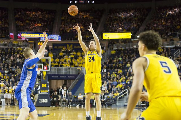 C.J. Baird (24) and Adrien Nunez (5)