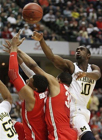 Jordan Morgan (52) and Tim Hardaway Jr. (10)