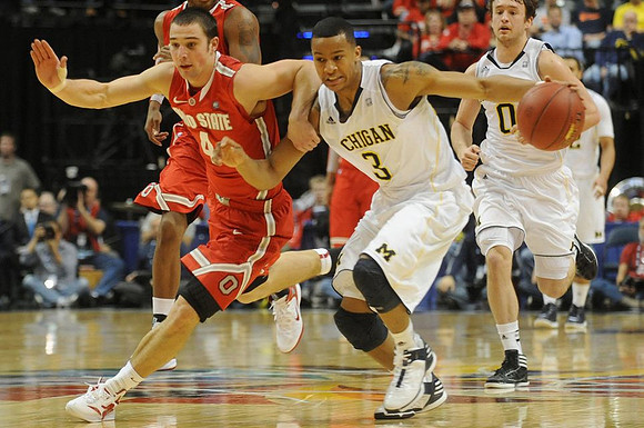 Trey Burke (3), Zack Novak (0), and Jordan Morgan (52)