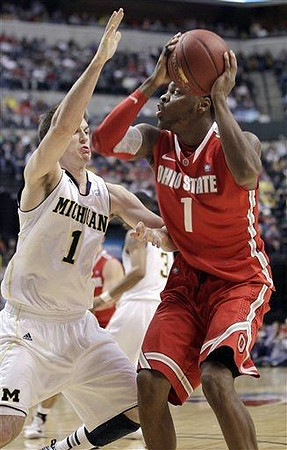Stu Douglass (1) and Trey Burke (3)
