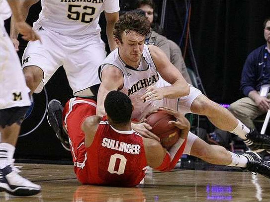 Jordan Morgan (52) and Zack Novak (0)