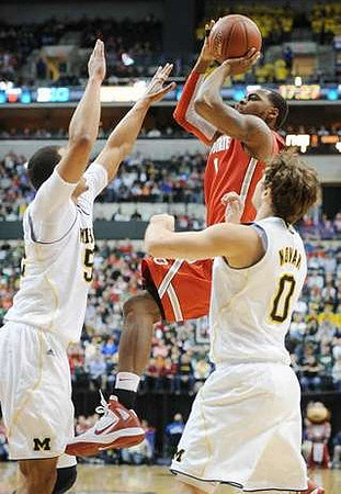 Jordan Morgan (52) and Zack Novak (0)