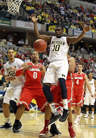 Jordan Morgan (52), Tim Hardaway Jr. (10), and Trey Burke (3)