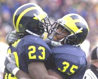 Chris Perry (23) and B.J. Askew (35)