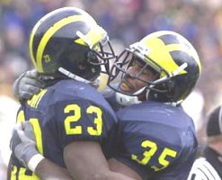 Chris Perry (23) and B.J. Askew (35)