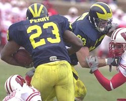 Chris Perry (23) and Bennie Joppru (83)