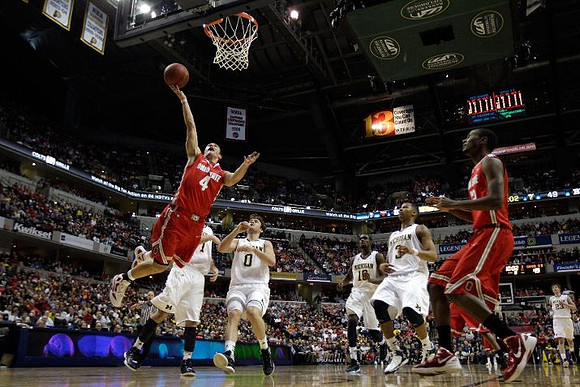 Stu Douglass (1), Zack Novak (0), Tim Hardaway Jr. (10), Trey Burke (3), and Evan Smotrycz (23)