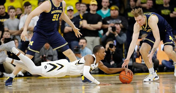 Austin Davis (51) and Ignas Brazdeikis (13)
