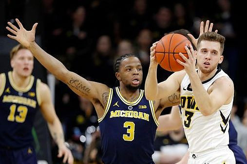 Ignas Brazdeikis (13) and Zavier Simpson (3)