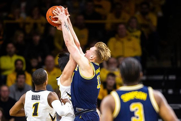 Ignas Brazdeikis (13) and Zavier Simpson (3)