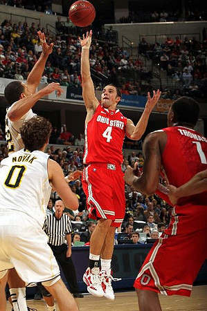 Jordan Morgan (52) and Zack Novak (0)