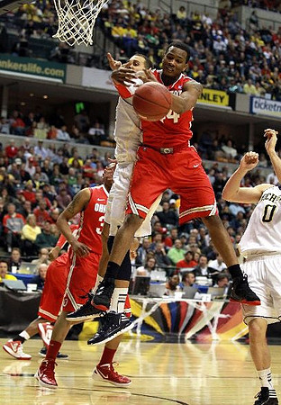 Jordan Morgan (52) and Zack Novak (0)