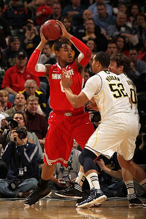 Jordan Morgan (52) and Zack Novak (0)