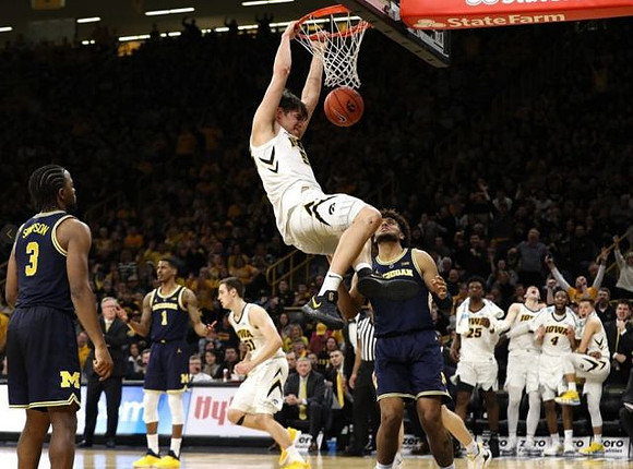 Zavier Simpson (3), Charles Matthews (1), and Isaiah Livers (4)