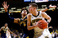 Charles Matthews (1) and Jordan Poole (2)