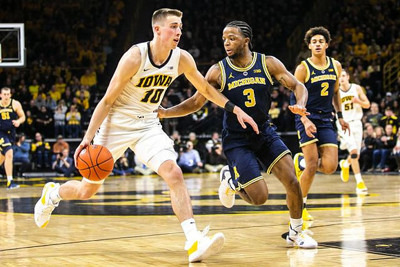 Zavier Simpson (3) and Jordan Poole (2)