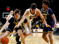 Colin Castleton (11) and Eli Brooks (55)