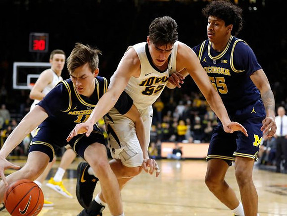Colin Castleton (11) and Eli Brooks (55)