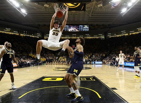 Zavier Simpson (3), Isaiah Livers (4), and Charles Matthews (1)