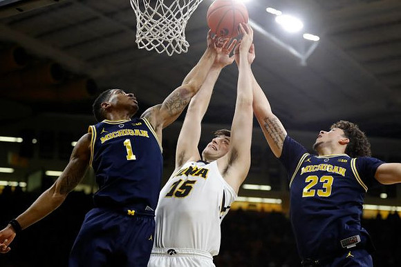 Charles Matthews (1) and Brandon Johns Jr. (23)