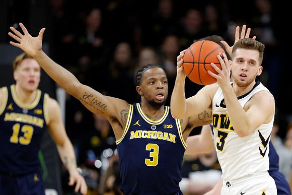 Ignas Brazdeikis (13) and Zavier Simpson (3)