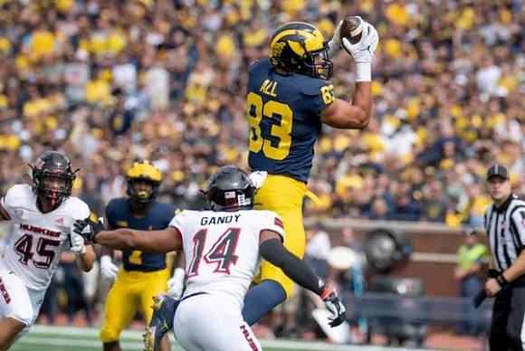 Donovan Edwards (7), and Erick All (83)