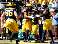 Luke Schoonmaker (86), Erick All (83), Blake Corum (2), and Trevor Keegan (77)
