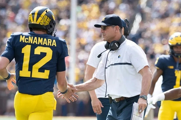 Cade McNamara (12), and Jim Harbaugh