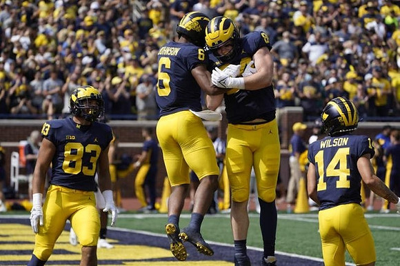 Erick All (83), Cornelius Johnson (6), Joel Honigford (84), and Roman Wilson (14)