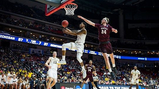 Ignas Brazdeikis (13), Charles Matthews (1), and Zavier Simpson (3)