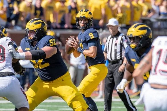 Karsen Barnhart (52), and J.J. McCarthy (9)
