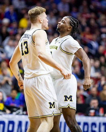 Ignas Brazdeikis (13) and Zavier Simpson (3)