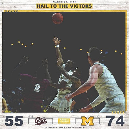 Zavier Simpson (3) and Jon Teske (15)