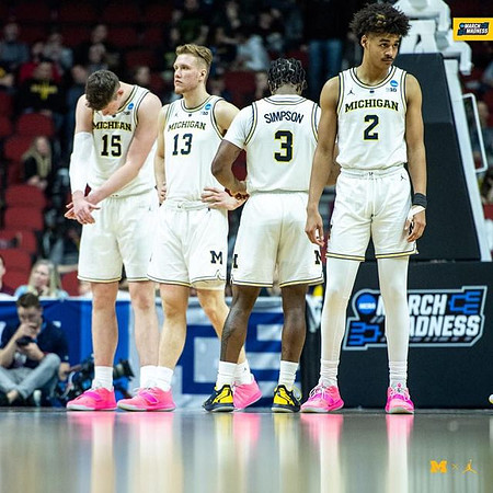 Jon Teske (15), Ignas Brazdeikis (13), Zavier Simpson (3), and Jordan Poole (2)