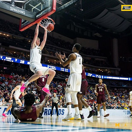 Jon Teske (15), Ignas Brazdeikis (13), Charles Matthews (1), and Zavier Simpson (3)
