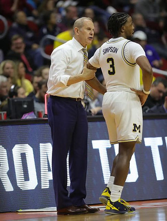 John Beilein and Zavier Simpson (3)